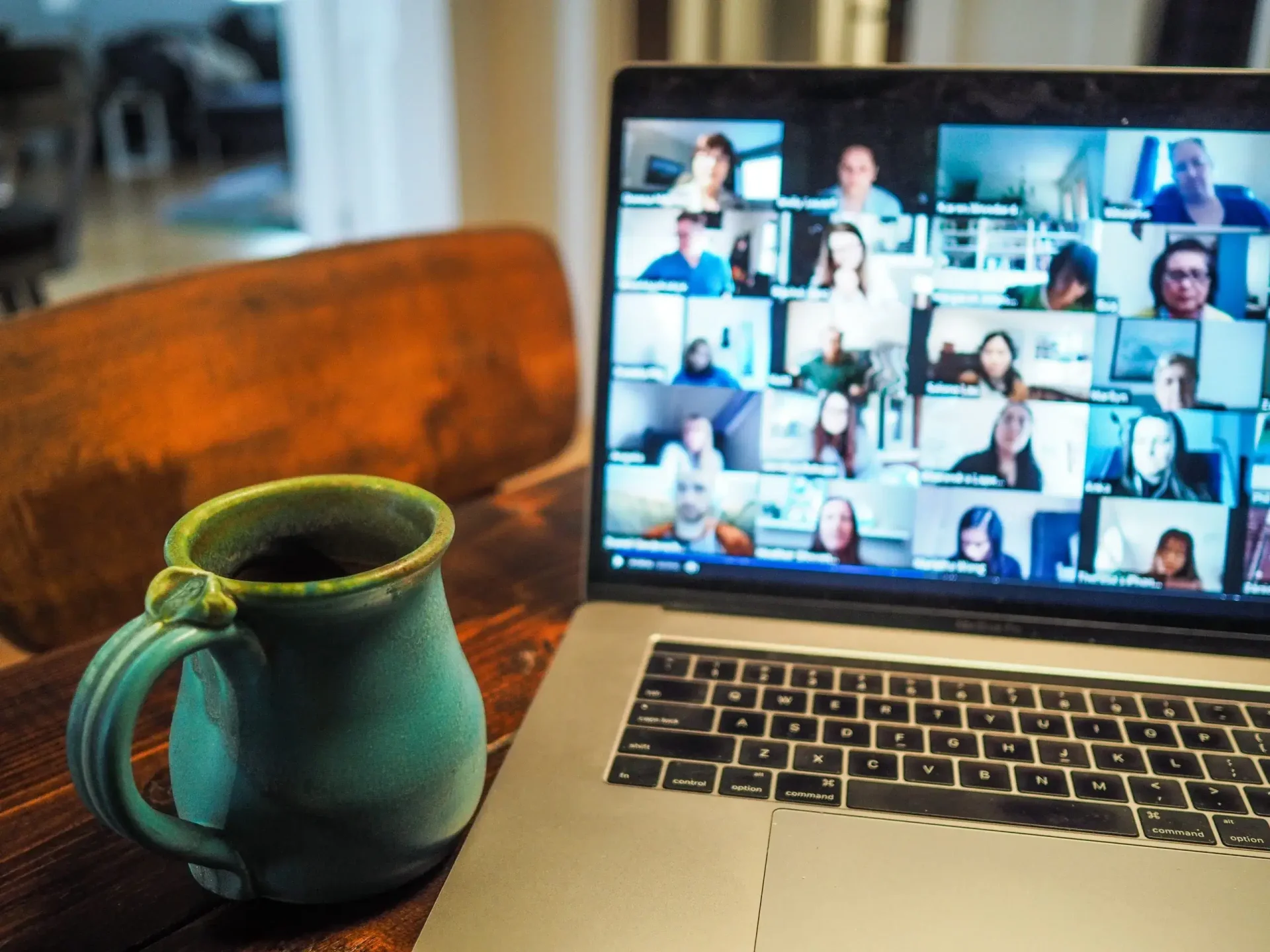 Laptop with video conference and mug